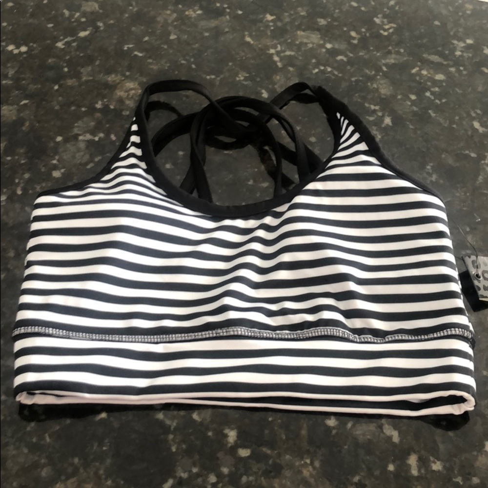 Jessica Simpson sports bra with tag.